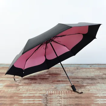 Kreative fire-blade udendørs plast paraply ni-i-en version tre-fold anti-UV skygge gave paraply lille sort paraply